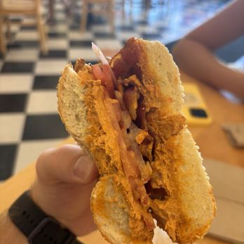 Moe's Broadway Bagel - Sesame bagel with Jalapeno Cream Cheese, bacon, and onion - Bagels Near Me - Boulder, Colorado