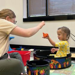 Musical Bridges - Lydia working with one of our clients in a music therapy session.