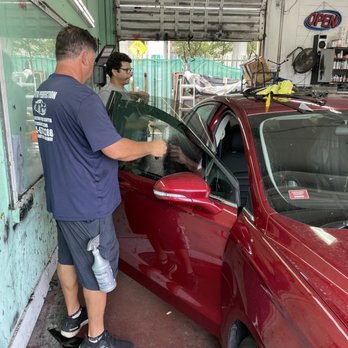 Auto Perfection Window Tinting - Cleaning and Measuring up the tints - Body Shops Near Me - Miami, Florida Auto Perfection Window Tinting - Cleaning and Measuring up the tints - Body Shops Near Me - Miami, Florida