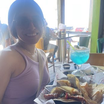 The Spot - Bar area with view of the beach. - Burgers Near Me - Galveston, Texas The Spot - Bar area with view of the beach. - Burgers Near Me - Galveston, Texas