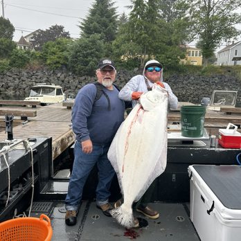 Sitka Fishing Excursions - Garry Wilson with a 60" halibut - Fishing Near Me - Sitka, Alaska