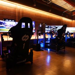 Swerv - Swerv will feature 10 P2 Podium1 Racing rigs. Sim racing rigs with motion, haptic feedback, wrapped in triple monitors.