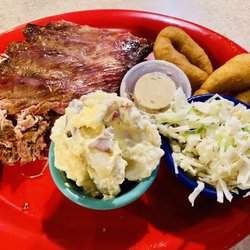 Bar-B-Que House - Ribs, chopped pork, potato salad, Cole slaw and hush puppies.