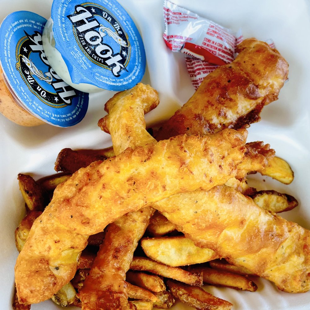 On the Hook - 3 Wild Alaskan Cod with beer battered fries, House made Tartar and Sriracha Mayo Sauce for dipping. - Food Trucks Near Me On the Hook - 3 Wild Alaskan Cod with beer battered fries, House made Tartar and Sriracha Mayo Sauce for dipping. - Food Trucks Near Me