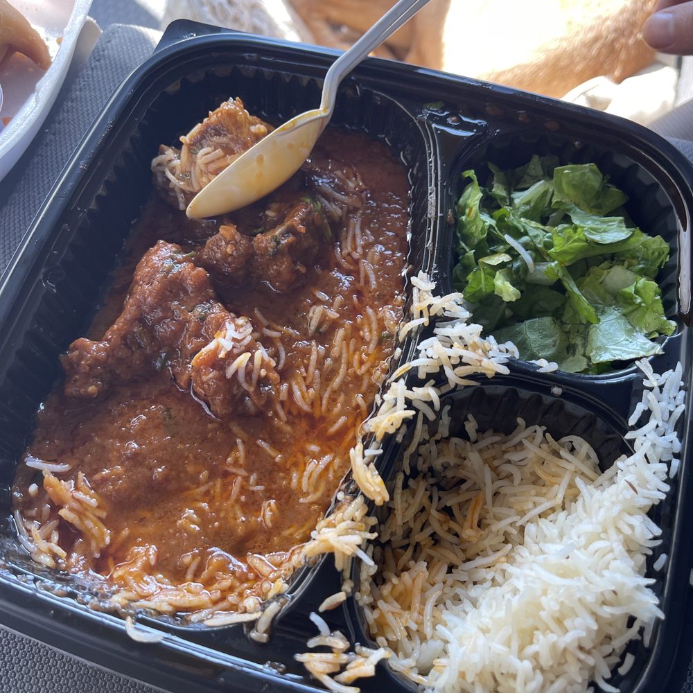 Goat curry half eaten because I have no self restraint for a picture
