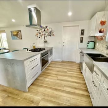 John Burke Construction - a kitchen with a center island - General Contractors Near Me - San Diego, California John Burke Construction - a kitchen with a center island - General Contractors Near Me - San Diego, California