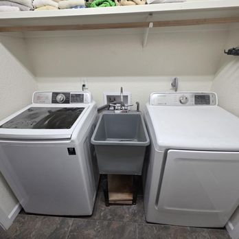 ServiceMaster Yuma - Filthy laundry room where the gas and water were left unhooked. - Damage Restoration Near Me - Yuma, Arizona ServiceMaster Yuma - Filthy laundry room where the gas and water were left unhooked. - Damage Restoration Near Me - Yuma, Arizona