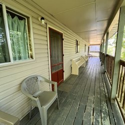 Eminence Canoes, Cottages & Camp - Back porch, shared with the neighbors cabin