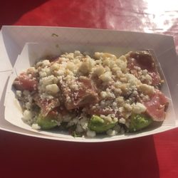 Seared tuna, whole avocado, pico de gallo, queso fresco, with sesame ginger sauce