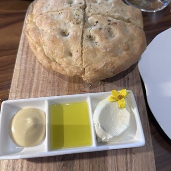 Il Girasole - Focaccia with garlic aoili, pure olive oil, lemon butter - Italian Near Me - Costa Mesa, California Il Girasole - Focaccia with garlic aoili, pure olive oil, lemon butter - Italian Near Me - Costa Mesa, California