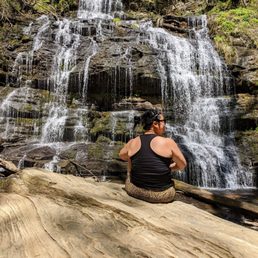 Enjoying the sound and sight of the waterfall Enjoying the sound and sight of the waterfall