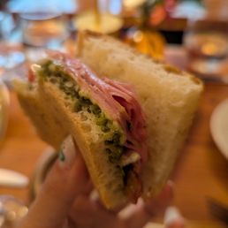 homemade focaccia filled with mortadella, stracciatella and pistachio pesto