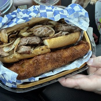 Houghton Meat Market - Filet mignon sandwich with grilled onions, mushrooms, on garlic bread with a large fried potato wedge that they added on for free - Seafood Markets Near Me - Tucson, Arizona