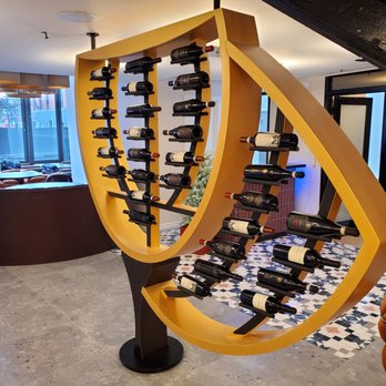Conversate Steak & Seafood - a display of wine bottles - Seafood Near Me - Hamilton, Ontario Conversate Steak & Seafood - a display of wine bottles - Seafood Near Me - Hamilton, Ontario