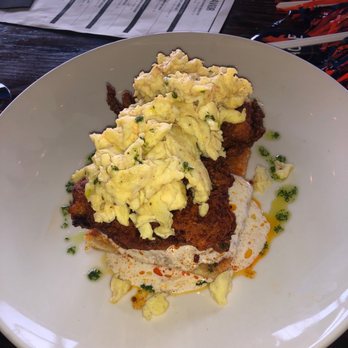 Pour Behavior - Nashville chicken biscuit with scrambled eggs - New American Near Me - Houston, Texas