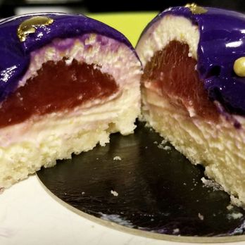 Patisserie Manuel - Amanda (white chocolate mousse with a strawberry center) - Bakeries Near Me - Silver Spring, Maryland Patisserie Manuel - Amanda (white chocolate mousse with a strawberry center) - Bakeries Near Me - Silver Spring, Maryland