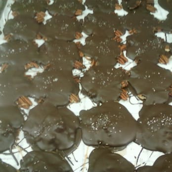 Sweet Freaks Chocolates - Dark Chocolate sandwiches fresh pecans and Sea Salted caramel. Yummy - Candy Stores Near Me - Chicago, Illinois Sweet Freaks Chocolates - Dark Chocolate sandwiches fresh pecans and Sea Salted caramel. Yummy - Candy Stores Near Me - Chicago, Illinois