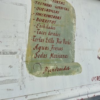 Taqueria La Reforma - a sign on the side of a truck - Food Trucks Near Me - Houston, Texas Taqueria La Reforma - a sign on the side of a truck - Food Trucks Near Me - Houston, Texas