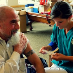 Oakton Community Center - Skokie resident Donald Rendler-Kaplan getting his flu shot. September 2014
