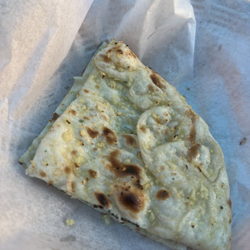 Himalaya Sono - Garlic Naan minus the two pieces we already had on our plate - Indian Near Me - Norwalk, Connecticut