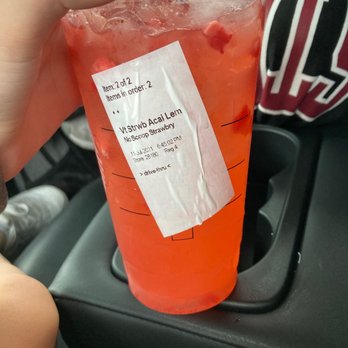 Starbucks - a hand holding a cup of iced tea - Coffee & Tea Near Me - Canfield, Ohio Starbucks - a hand holding a cup of iced tea - Coffee & Tea Near Me - Canfield, Ohio