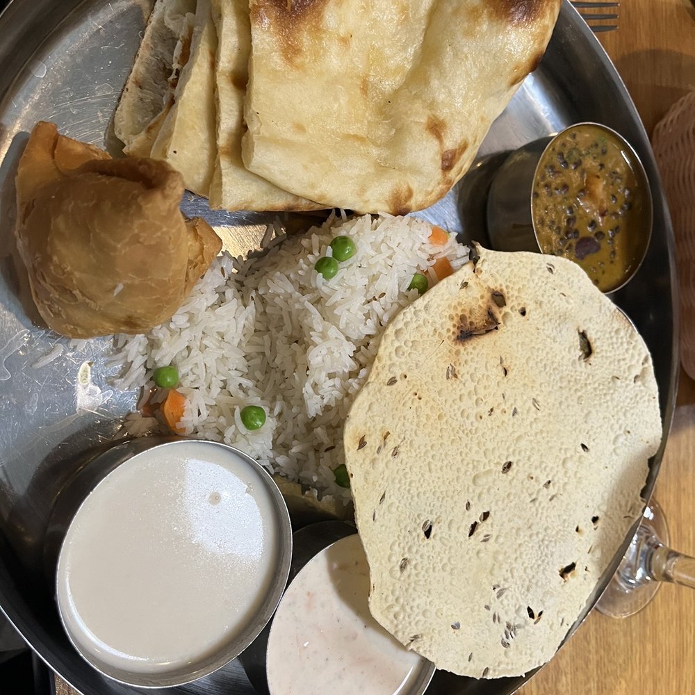 Himalayan Yeti - Thakali with papad, saag paneer, veggie samosa, rice, dal bhaat, khir, yogurt, naan...so much value for a very cheap price. - Indian Near Me - St. Louis, Missouri Himalayan Yeti - Thakali with papad, saag paneer, veggie samosa, rice, dal bhaat, khir, yogurt, naan...so much value for a very cheap price. - Indian Near Me - St. Louis, Missouri