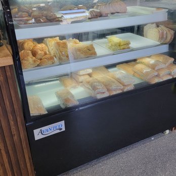 DI Coffee Bar - Bakery case with lots of tasty pastries. - Coffee & Tea Near Me - Tampa, Florida DI Coffee Bar - Bakery case with lots of tasty pastries. - Coffee & Tea Near Me - Tampa, Florida