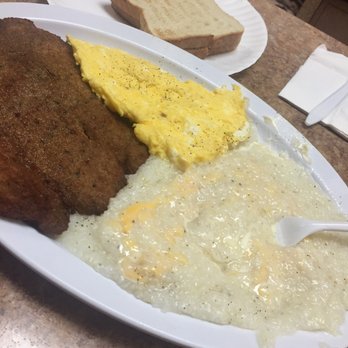 Dennis Place - Cheese grits, fried tilapia, eggs and toast $9. Somebody smack me. - Breakfast & Brunch Near Me - Brooklyn, New York