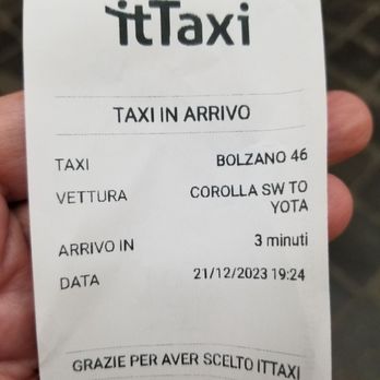 Hotel Quirinale - Reception ordered a taxi for us. This slip tells us which taxi is for us. - Hotels Near Me - Rome, RM