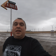 Photo of Midpoint Cafe And Gift Shop - Adrian, TX, United States. Selfie with the signs