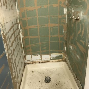 Handyman Pro 67 - Prepping for bathroom remodel by stripping all old paint and tile. - Electricians Near Me