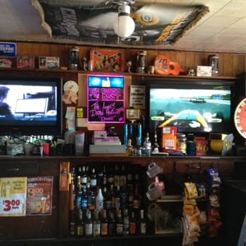 Boar's Nest - a bar with a television and various liquors - American Near Me - Darien, Wisconsin