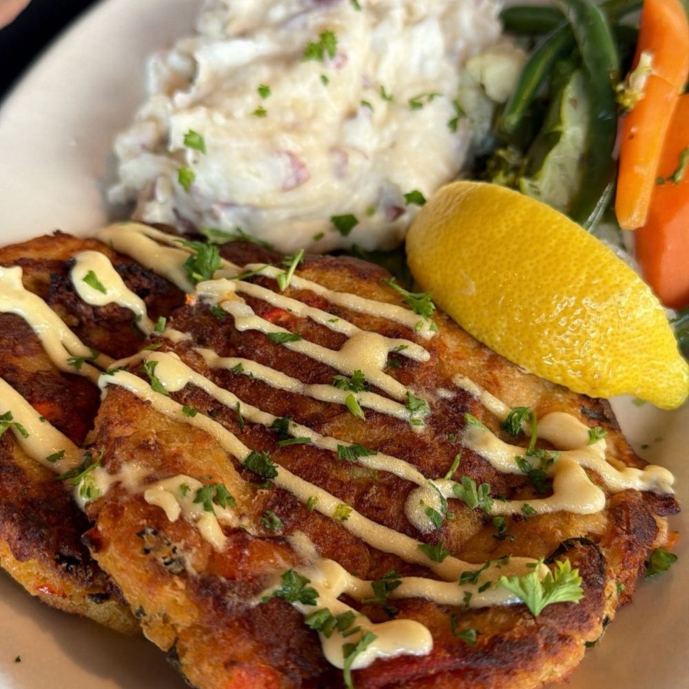 Boston Sail Loft - Pan seared lobster and lump crab cake - Bars Near Me - Boston, Massachusetts Boston Sail Loft - Pan seared lobster and lump crab cake - Bars Near Me - Boston, Massachusetts