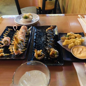 Sushi Nini - Red devil (left) spider roll (right) far right is calamari - Sushi Bars Near Me - Round Rock, Texas Sushi Nini - Red devil (left) spider roll (right) far right is calamari - Sushi Bars Near Me - Round Rock, Texas