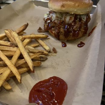 Keg & Cow - Pulled pork sandwich and garlic parm fries - American Near Me - Cape Coral, Florida