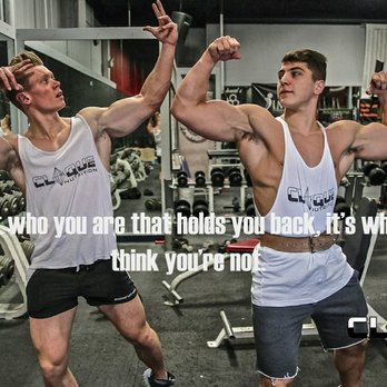 Clique Nutrition - two men flexing their muscles in a gym - Health Markets Near Me - Joliet, Illinois