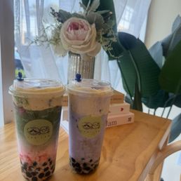 Matcha strawberry and Taro milk tea both with crème brûlée topping Matcha strawberry and Taro milk tea both with crème brûlée topping