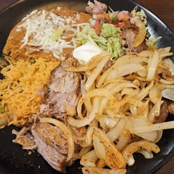 Frida's Cocina & Tequila - Pork onions rice & beans