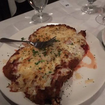 Tresca - This is the breaded veal chop.  I tried to show how big it is but pic doesn't do it justice!  Size of a serving platter! - Italian Near Me - Boston, Massachusetts