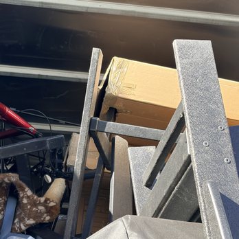 PDX Movers - box skewered because placed on top of chair legs - Movers Near Me - Tualatin, Oregon PDX Movers - box skewered because placed on top of chair legs - Movers Near Me - Tualatin, Oregon