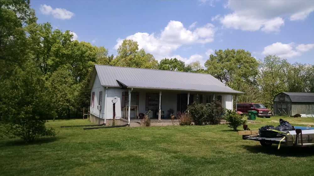 Slide of JC Metal Roofing