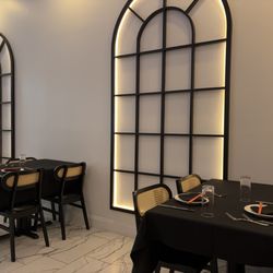 Opposite wall.