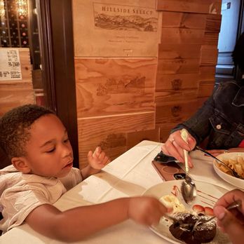 Sardelli - Logan approves the chocolate cake! - Italian Near Me - Hollywood, Florida Sardelli - Logan approves the chocolate cake! - Italian Near Me - Hollywood, Florida