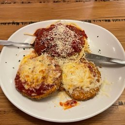 Eggplant Parmesan with an included side of spaghetti and sauce, Very nice. Eggplant Parmesan with an included side of spaghetti and sauce, Very nice.