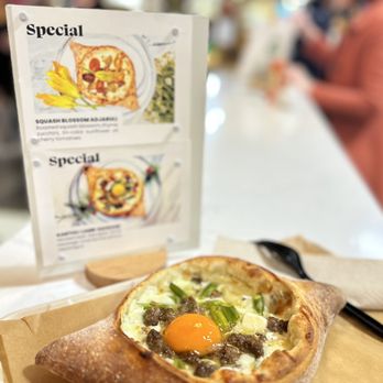 Saami Somi - a pizza with an egg on it - Georgian Near Me - Philadelphia, Pennsylvania Saami Somi - a pizza with an egg on it - Georgian Near Me - Philadelphia, Pennsylvania