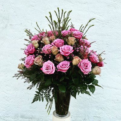 Vased Bouquets - call us to place your order for a beautiful bouquet in a vase. Vased Bouquets - call us to place your order for a beautiful bouquet in a vase.