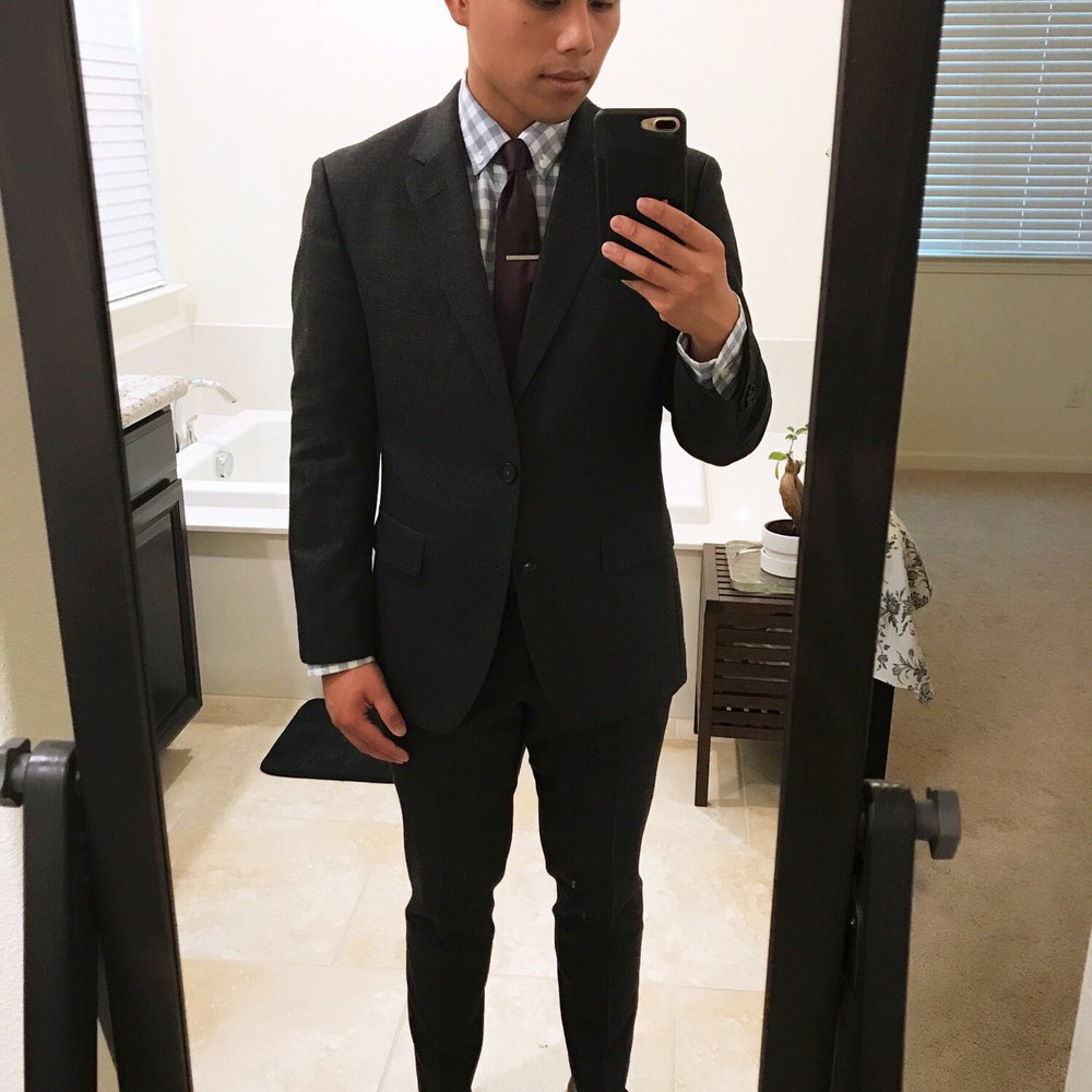 Jacket brought in, trimmed sleeves, tapered pants, reduced waistline.