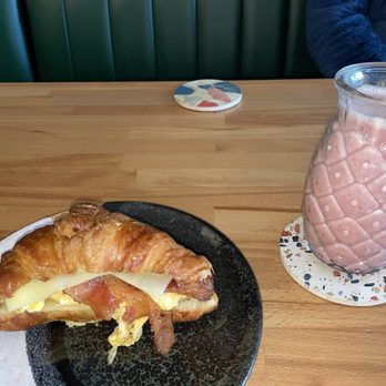 Lokal Coffee - Bacon Egg & Cheese Sandwich on a croissant Creamy Smoothie with oat milk - Coffee & Tea Near Me - Cranford, New Jersey Lokal Coffee - Bacon Egg & Cheese Sandwich on a croissant Creamy Smoothie with oat milk - Coffee & Tea Near Me - Cranford, New Jersey