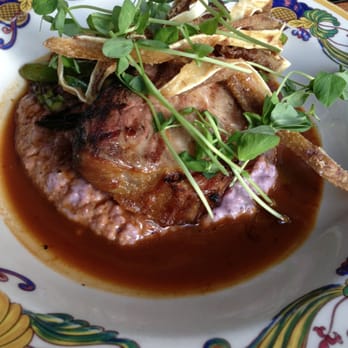 Palace Kitchen - Grilled Pork Loin, crispy pigs ears, smoked bacon - New American Near Me - Seattle, Washington