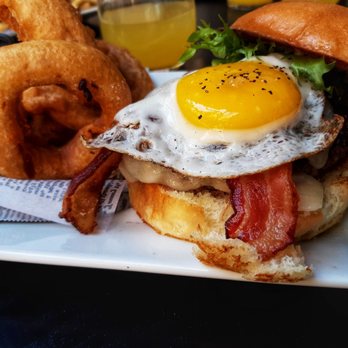 The State - Drunken pig burger with side of onion rings - Whiskey Bars Near Me - Rancho Cucamonga, California The State - Drunken pig burger with side of onion rings - Whiskey Bars Near Me - Rancho Cucamonga, California